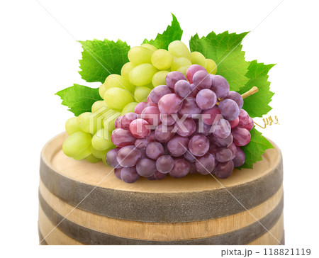 Bunches of white and red grapes on top of a wooden wine barrel isolated on white Bunches of white and red grapes on top of a wooden wine barrel isolated on white 118821119