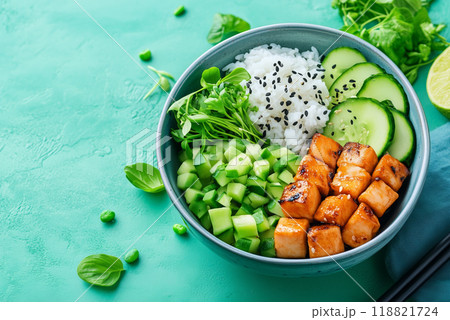 Healthy bowl with grilled chicken, rice, and fresh vegetables 118821724
