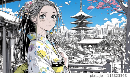 和服を着て初詣をしている若い女性