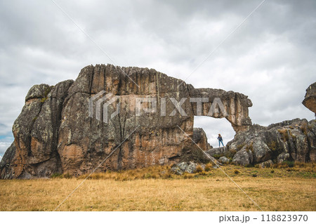 The sky is cloudy and the grass is dry, Huayllay Stone Forest, Peru. The sky is cloudy and the grass is dry, Huayllay Stone Forest, Peru. 118823970