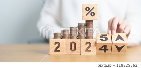 2024 to 2025 New year with percentage change to UP and Down arrow with coin stack. Interest rate, GDP, stocks market, financial, deflation and Inflation, mortgage, debt, Loan and Economic Recession 118825362