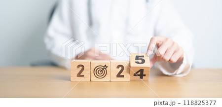 2024 year change to 2025 year block with dartboard icon again doctor. Goal, Target, Resolution, strategy, plan, Action, mission, motivation, Health, Healthcare, medical and wellness concept 118825377