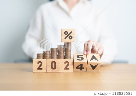 2024 to 2025 New year with percentage change to UP and Down arrow with coin stack. Interest rate, GDP, stocks market, financial, deflation and Inflation, mortgage, debt, Loan and Economic Recession 118825585