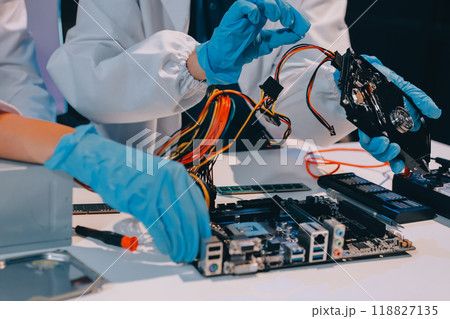 Electronics technician, electronic engineering electronic repair, electronics measuring and testing, repair and maintenance concepts. Electronics technician, electronic engineering electronic repair, electronics measuring and testing, repair and maintenance concepts. 118827135