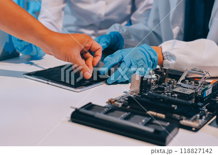 Electronics technician, electronic engineering electronic repair, electronics measuring and testing, repair and maintenance concepts. Electronics technician, electronic engineering electronic repair, electronics measuring and testing, repair and maintenance concepts. 118827142