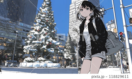 クリスマスイルミネーションが美しい街を散策する若い女性