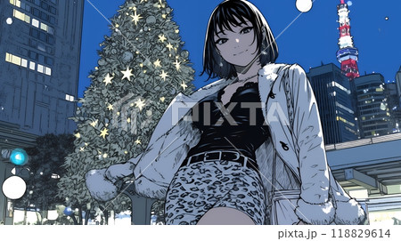クリスマスイルミネーションが美しい街を散策する若い女性