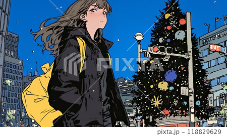 クリスマスイルミネーションが美しい街を散策する若い女性