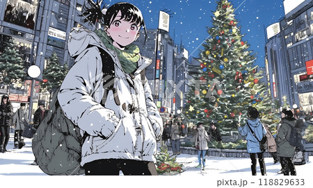 クリスマスイルミネーションが美しい街を散策する若い女性