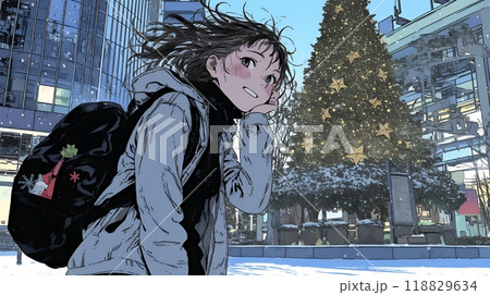 クリスマスイルミネーションが美しい街を散策する若い女性