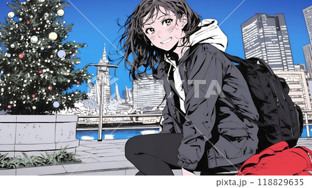 クリスマスイルミネーションが美しい街を散策する若い女性