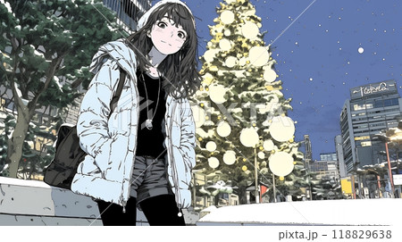 クリスマスイルミネーションが美しい街を散策する若い女性