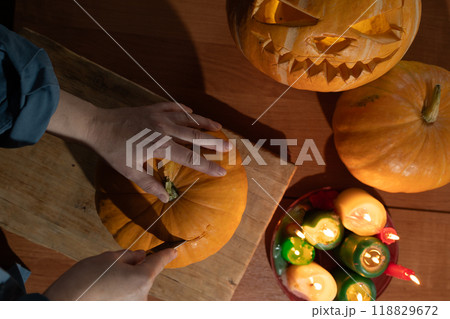 Engaging in Festive Pumpkin Carving and Exciting Halloween Preparation Activities is Fun Engaging in Festive Pumpkin Carving and Exciting Halloween Preparation Activities is Fun 118829672