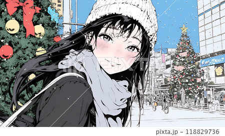 ホワイトクリスマスの街を歩く若い女性