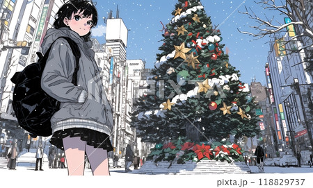 ホワイトクリスマスの街を歩く若い女性