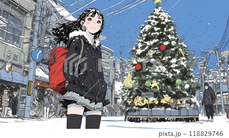 ホワイトクリスマスの街を歩く若い女性