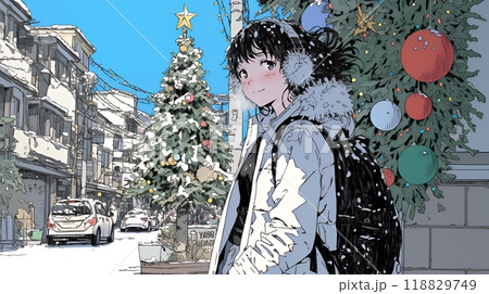 ホワイトクリスマスの街を歩く若い女性