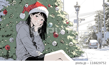 ホワイトクリスマスの街を歩く若い女性