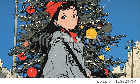 ホワイトクリスマスの街を歩く若い女性