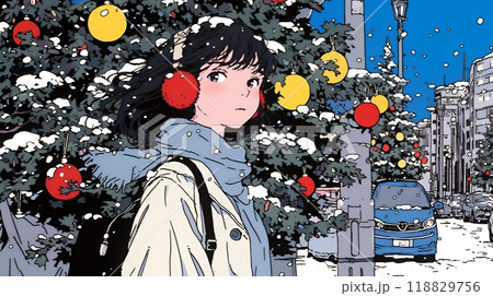 ホワイトクリスマスの街を歩く若い女性