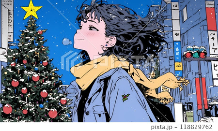 ホワイトクリスマスの街を歩く若い女性