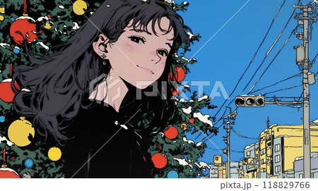 ホワイトクリスマスの街を歩く若い女性