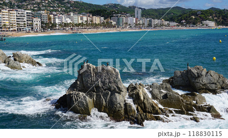 Spain. Beautiful views of the beach of Lloret De Mar. The beach in Costa Brava of Catalonia at sunny day Spain. Beautiful views of the beach of Lloret De Mar. The beach in Costa Brava of Catalonia at sunny day 118830115