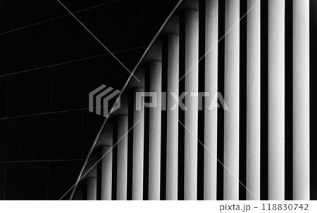 A structure featuring wooden slats on construction site contributing to its architectural style 118830742