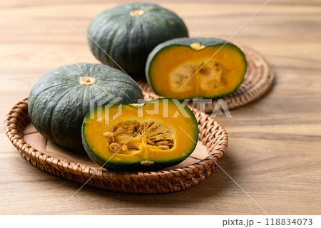 Green pumpkin or Japanese pumpkin on wooden background Green pumpkin or Japanese pumpkin on wooden background 118834073
