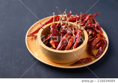 Dried red chili pepper in bowl on black background, Food ingredient Dried red chili pepper in bowl on black background, Food ingredient 118834084
