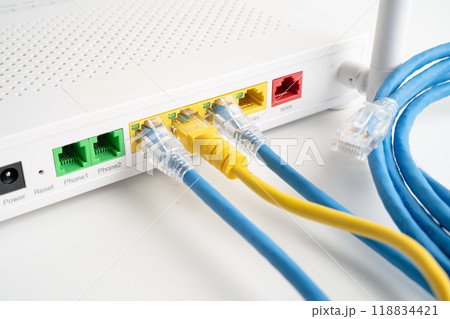 Ethernet cable with wireless router connect to internet service provider internet network. 118834421
