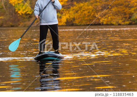 Paddleboarding in Autumn Serenity 118835463