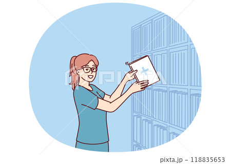 Woman clinic administrator with patient card stands near rack with archive of patients Woman clinic administrator with patient card stands near rack with archive of patients 118835653