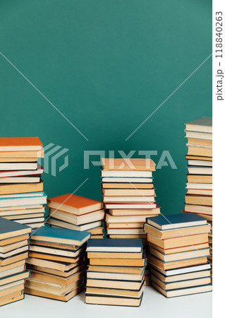 Stacks of educational books for learning in the library as a background 118840263