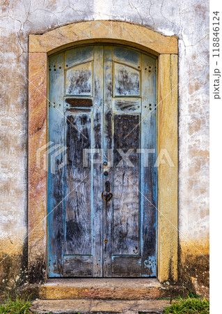 Carved wooden gate in an old baroque church Carved wooden gate in an old baroque church 118846124