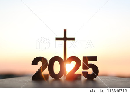 The brightly rising sun of the new year 2025, sunrise and sunset, the holy cross of Jesus Christ and the church faith and belief background 118846716