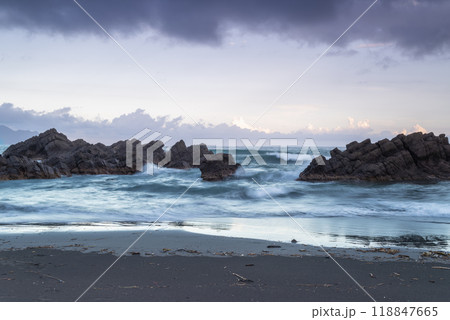 Tranquil Twilight Tide: Rocky Cove at Sunset. Toucheng, Yilan, Taiwan. Tranquil Twilight Tide: Rocky Cove at Sunset. Toucheng, Yilan, Taiwan. 118847665