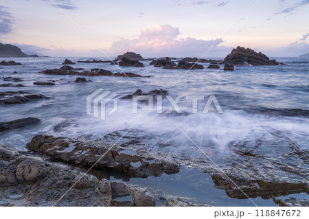 Tranquil Twilight Tide: Rocky Cove at Sunset. Toucheng, Yilan, Taiwan. Tranquil Twilight Tide: Rocky Cove at Sunset. Toucheng, Yilan, Taiwan. 118847672