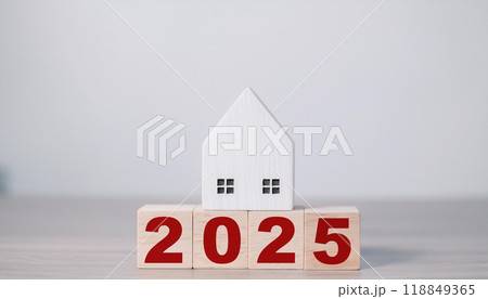 Simple Wooden House Model on 2025 Wooden Blocks with Neutral Background for Real Estate Vision Simple Wooden House Model on 2025 Wooden Blocks with Neutral Background for Real Estate Vision 118849365
