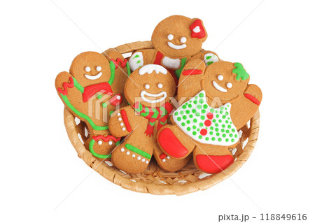 christmas gingerbread cookie in a wicker basket isolated on white background 118849616