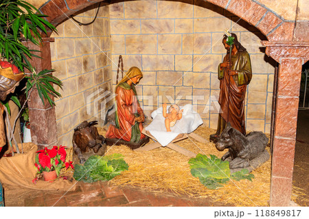 Christmas Nativity Scene. Intricately crafted nativity scene with figurines depicting the birth of Jesus, symbolizing the religious significance of Christmas Christmas Nativity Scene. Intricately crafted nativity scene with figurines depicting the birth of Jesus, symbolizing the religious significance of Christmas 118849817
