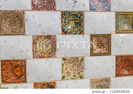 Mosaic wall by Antoni Gaudi in the Park Guell in Barcelona, Catalonia, Spain 118849830