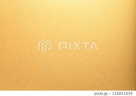 Gold paper with a smooth, glossy texture and bright, glowing gradient. The shining metallic surface Gold paper with a smooth, glossy texture and bright, glowing gradient. The shining metallic surface 118851834