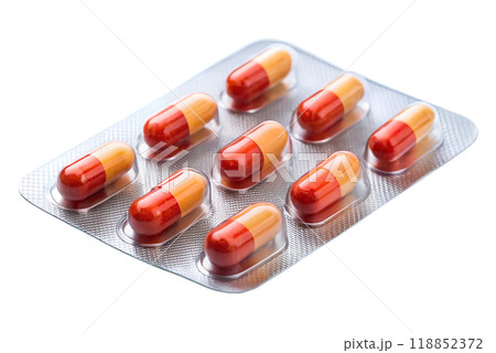Medical pills in blister pack isolated on white background. Metal tablet blister. Silver blister with drugs 118852372
