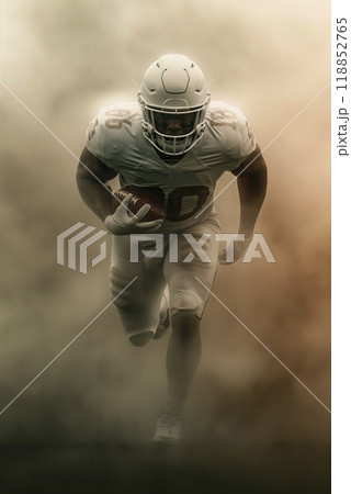 Vertical portrait of a football player running across the field with the ball through the smoke, vertical poster for the championship 118852765
