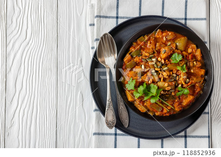 healthy zucchini stew in tomato sauce, top view 118852936