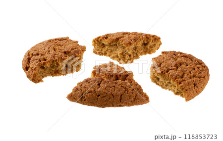 Broken round oatmeal cookies isolated on white background. 118853723