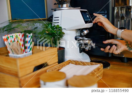 A Modern Espresso Machine displayed in a Cozy Coffee Shop Setting with inviting ambiance 118855490