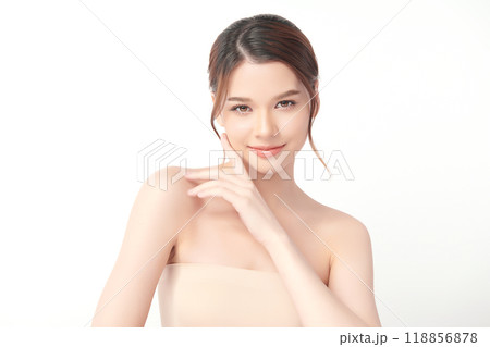 Beautiful young asian woman with clean fresh skin on white background, Face care, Facial treatment, Cosmetology, beauty and spa, Asian women portrait. Beautiful young asian woman with clean fresh skin on white background, Face care, Facial treatment, Cosmetology, beauty and spa, Asian women portrait. 118856878