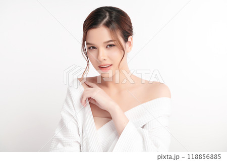 Beautiful young asian woman with clean fresh skin on white background, Face care, Facial treatment, Cosmetology, beauty and spa, Asian women portrait. Beautiful young asian woman with clean fresh skin on white background, Face care, Facial treatment, Cosmetology, beauty and spa, Asian women portrait. 118856885